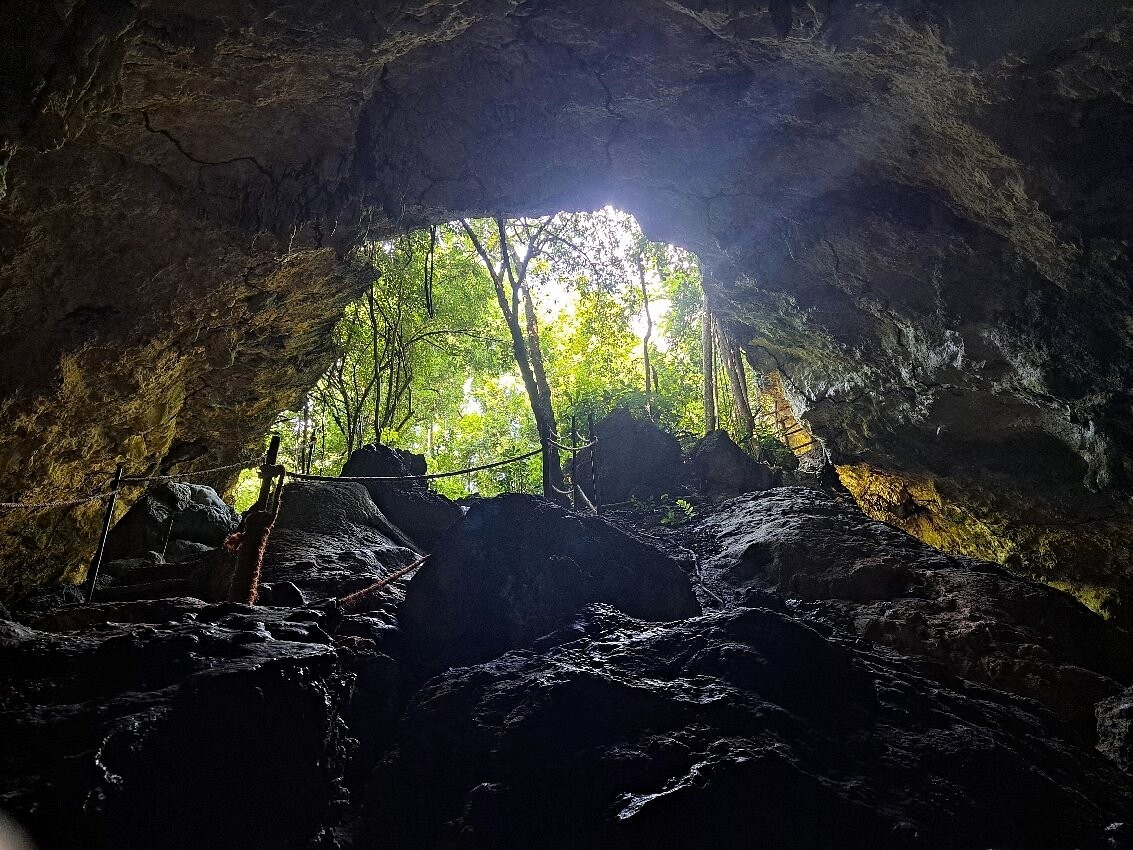 Scenic entrance and pathway leading into Kuza Cave in Zanzibar
