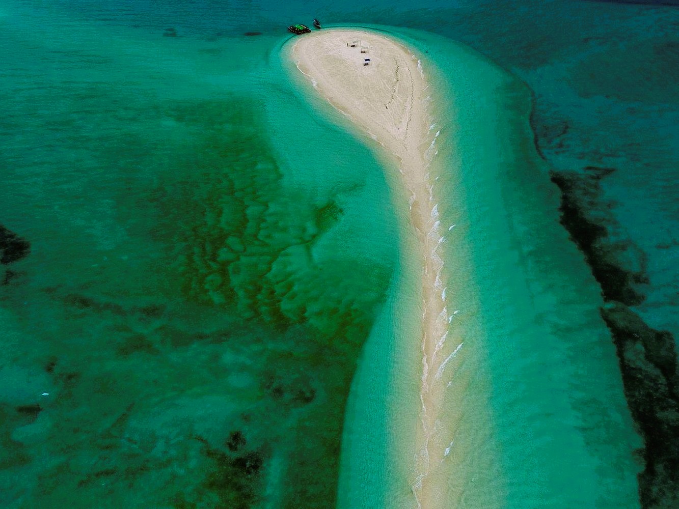 Beachside dining with fresh seafood at Nakupenda Island